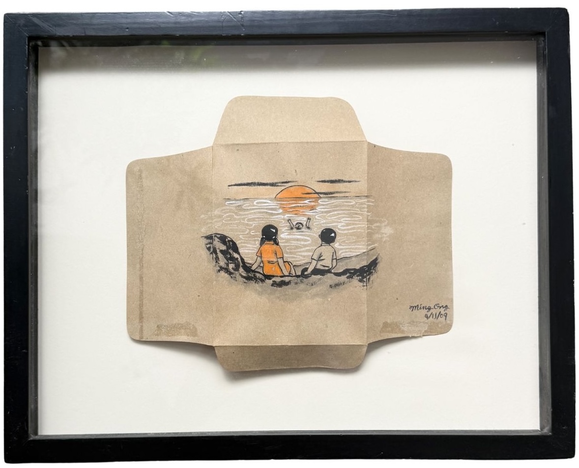 Ming Ong painting on unfolded cardboard box